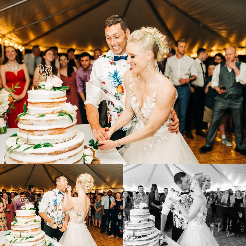Cake cutting at reception featuring a naked style cake made by family.