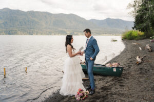 Couple stands in front of Lake Quinault in Washington to exchange their vows.